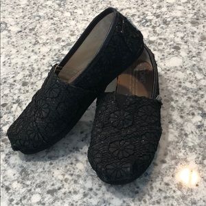 Black floral glitter girl Toms. Good condition